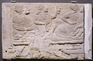 Cippi showing a banquet by Etruscan